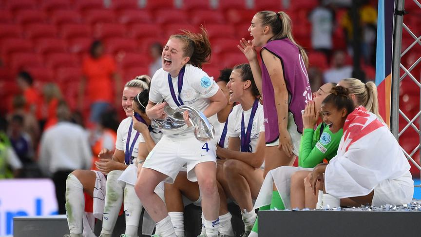 England's midfielder Keira Walsh celebrates with the trophy as England's players celebrate after their win in the UEFA Women's Euro 2022 final football match between England and Germany at the Wembley stadium, in London, on July 31, 2022. England won a major women's tournament for the first time as Chloe Kelly's extra-time goal secured a 2-1 victory over Germany at a sold out Wembley on Sunday. 